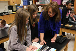 Teacher with students