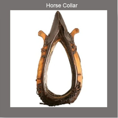 A leather and wooden animal collar that is shaped like a teardrop.