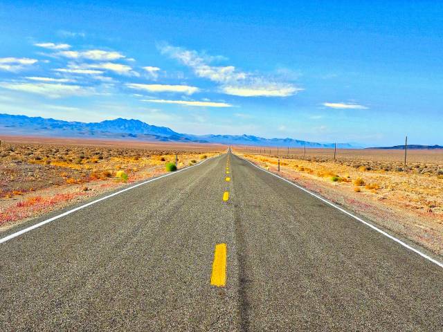 A beautiful stretch of secluded mountainous highway in Nevada.