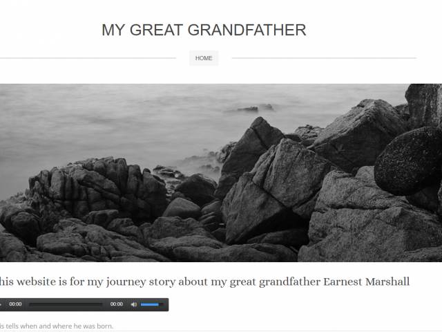 Screenshot of a student website that features a photograph of a craggy coastline.