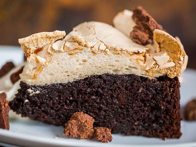 A rich and delicious detail of a piece of chocolate cake.