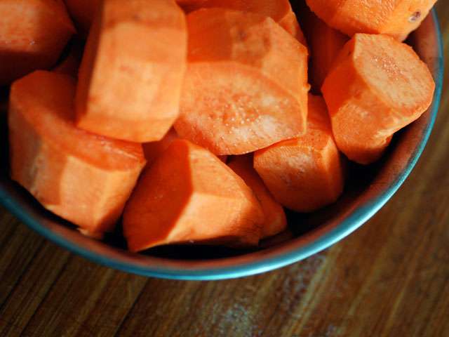 Diced up yams in a metal bowl. Photo by Jacqueline. Flickr Creative Commons. Attribution Non-Commerical. 2.0