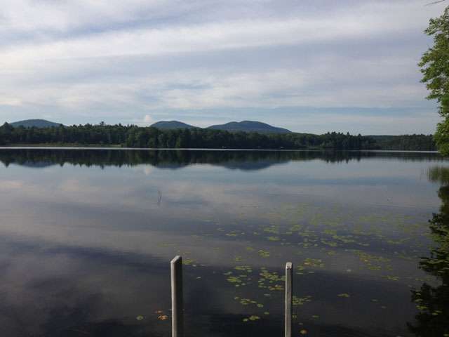 A view of peaceful Maine lake.