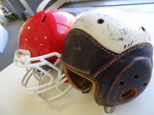 Football helmets in the Hometown Teams exhibition.