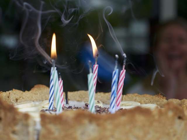 A close-up view of candles on a birthday cake. Pexels stock photo