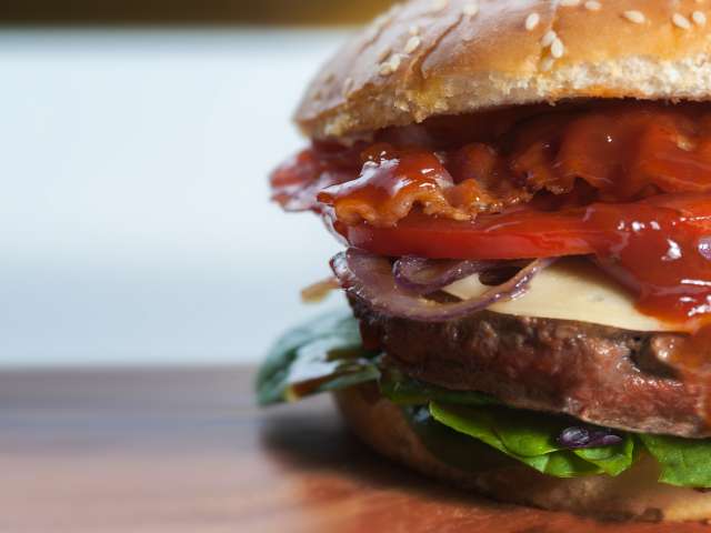 A close-up view of a juicy hamburger. Pexels stock photo