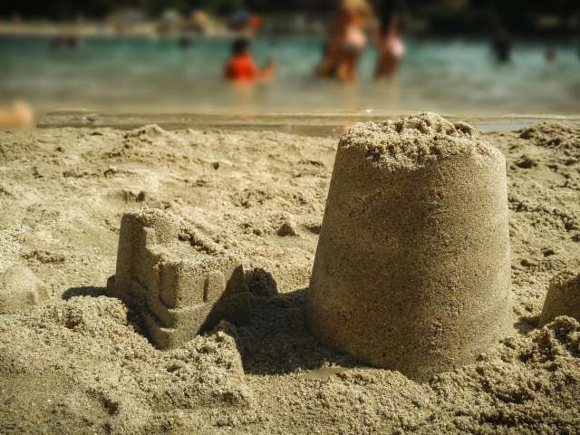 Sandcastles on a beach. Pixabay stock photo