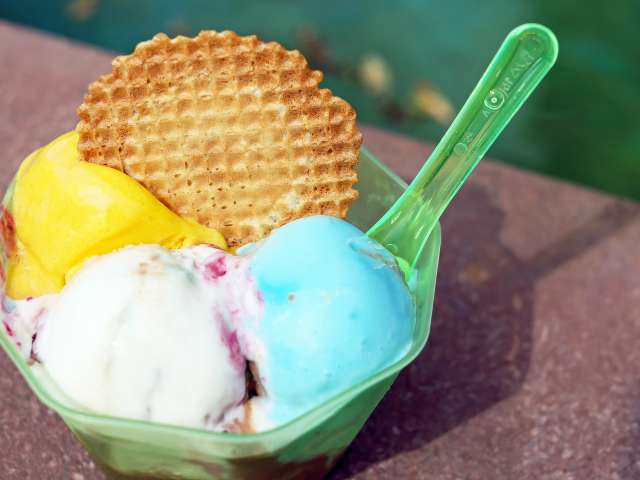 A plastic bowl with three heaping scoops of ice cream. Pexels stock photo