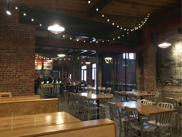 The interior of Trapezium brewery with twinkling lights. Photo by Alex 